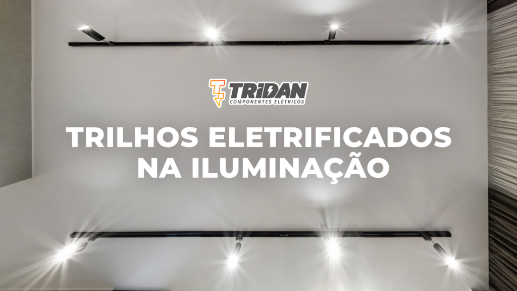 Teto com um trilho eletrificado cheio de spots de led, com a seguinte frase: "Trilhos eletrificados na iluminação".